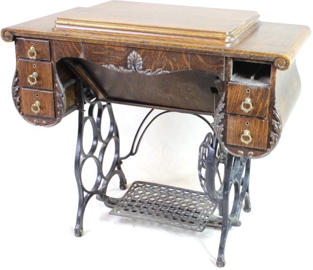 Antique oak cased Damascus Rotary treadle sewing