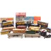 Image 1 : Collection of toy trains and accessories.