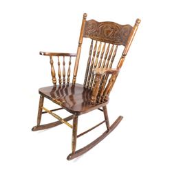 Vintage press back rocking chair.