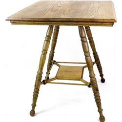 Antique oak parlor table on turned legs