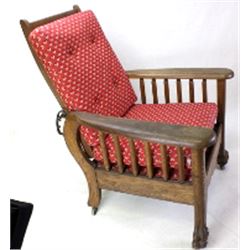 Antique oak morris chair with large carved lions