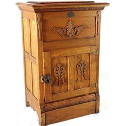 Nice antique oak ice box with applied carvings,