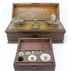 Antique oak cased scale marked Henry