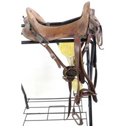 Brown leather McClellan saddle