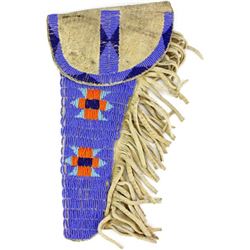 Contemporary beaded flap holster on tanned