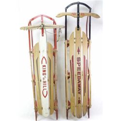 Collection of 2 vintage sleds includes