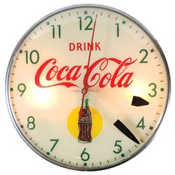 Coca-Cola clock, light-up w/bottle graphic, 1950's, Pam Clock Co. glass face, mfg by Telechron-Ashla