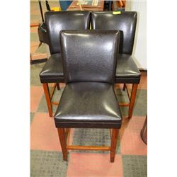 SET OF THREE BLACK WOOD AND LEATHER CHAIRS