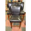Image 1 : SET OF THREE BLACK WOOD AND LEATHER CHAIRS