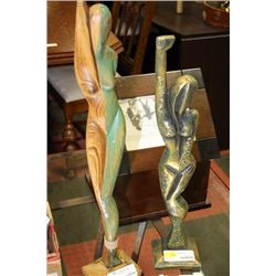 TWO WOOD CARVED LADY ORNAMENTS