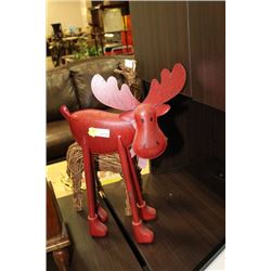 TWO METAL AND WOOD REINDEER ORNAMENTS