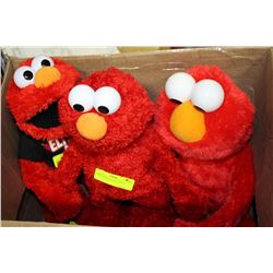 BOX WITH THREE ELMO DOLLS