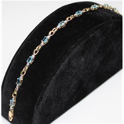 10KT YELLOW GOLD BLUE TOPAZ & DIAMOND BRACELET