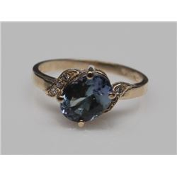 STAMPED 14KT. YELLOW GOLD TANZANITE & DIAMOND RING