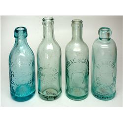 Four California Soda Bottles