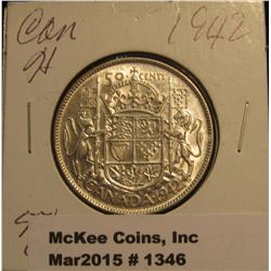 1346. 1942 Canada Silver Half Dollar. EF 40.