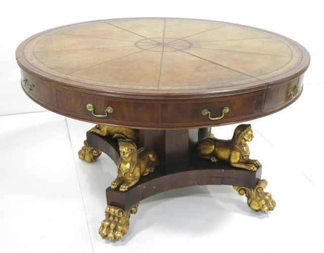 Leather drum table with Sphinx legs