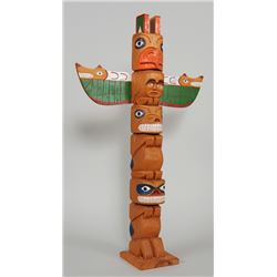 Northwest Coast Totem Carved with Four Figures by Jasper Peters 31" H. 19" W.  Good Condition