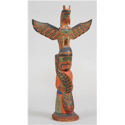 Charlie James Totem Carved with Thunderbird and Shamam Holding a Sculpin - Signed Charlie James  Yak
