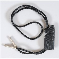 Bolo Tie with Carved Argillite Thunderbird In Silver Frame by Denny Dixon 1 1/2" H.  Good Condition