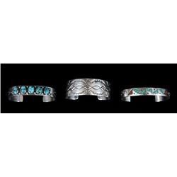 Two Southwest Silver and Turquoise Bracelets and a Navajo Silver Bracelet with Stamped Design 5 3/4"