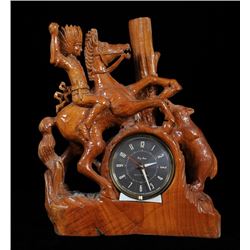 Carved Old West Motif Clock with Warrior on Horseback 16 1/2" H. 13 1/2" W.  Good Condition