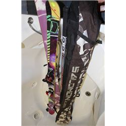 2 SETS OF SKIS SOLD W 2 HOCKEY STICKS