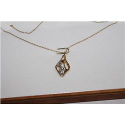 #87 10 KT DIAMOND PENDANT NECKLACE
