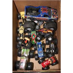 BOX OF DIE CAST MONSTER TRUCKS & SKATEBOARDS