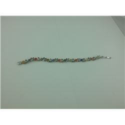 ONE STERLING SILVER MULTI COLOUR SAPPHIRE BRACELET WITH 55 BLACK SAPPHIRES (ONE STONE MISSING), AND