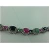 Image 2 : ONE STERLING SILVER RUBY, BLACK SAPPHIRE  AND EMERALD BRACELET WITH CUBIC ZIRCONIA ACCENTS. HAS 220