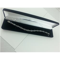 12 MARQUISE BLUE TOPAZ TENNIS BRACELET SET WITH DIAMOND. 6.50CARAT. STERLING SILVER. INCLUDES $525