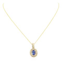 14KT Yellow Gold 4.19 ctw Tanzanite and Diamond Pendant with Chain