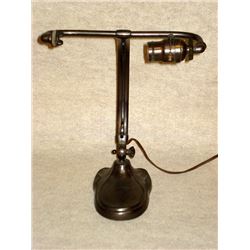 Signed Handel desk lamp base in very good condition, articulated at base, lamp will hold an 8.25"W s
