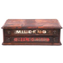 Two drawer spool cabinet with reverse painted drawer fronts signed "Mile-End" (with some paint loss)