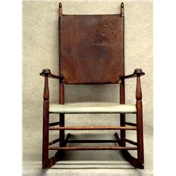 Shaker rocker with a modified Arts & Crafts leather back and canvas seat - back with embossed female