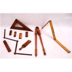 Grouping of early measuring tools including a wooden compass 16.5"L, triangular shaped wooden square