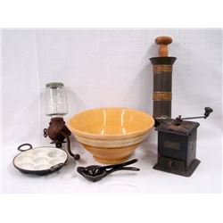 Grouping of country items including an enameled cast iron egg poacher with handle, a tole sausage st