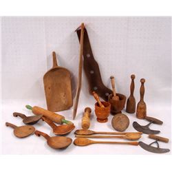 Grouping of country treenware including: Early carved butter mold in leaves pattern, large carved sc