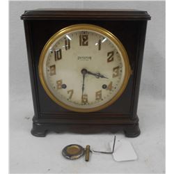 Ingraham eight day mantel clock with strike on the hour and half hour, recently serviced, runs. Maho