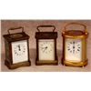 Image 1 : Three carriage clocks including 1) a brass and beveled glass case, porcelain Arabic numeral dial mar