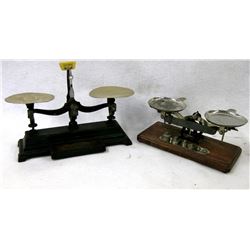 Two balance scales including 1)  Henry Troemner, Philadelphia, PA. No. 6 - four ounce scale, with a 