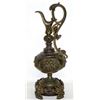 Image 2 : Three ewers including: 1) made of bronze with an eagle like head at the top of the handle and two ch