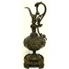 Image 3 : Three ewers including: 1) made of bronze with an eagle like head at the top of the handle and two ch