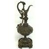 Image 4 : Three ewers including: 1) made of bronze with an eagle like head at the top of the handle and two ch