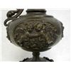 Image 5 : Three ewers including: 1) made of bronze with an eagle like head at the top of the handle and two ch