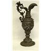 Image 8 : Three ewers including: 1) made of bronze with an eagle like head at the top of the handle and two ch