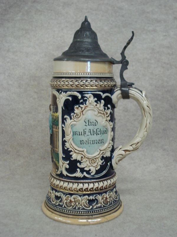 Three 1/2 liter German Beer Steins with pewter lids, one signed D.R.G.M