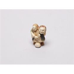 20th C. Netsuke Ivory - Figure Holding Mask