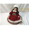 Image 1 : PORCELAIN MUSICAL DOLL